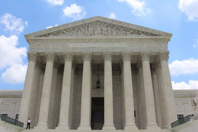 Supreme Court - Photo by Claire Anderson on Unsplash